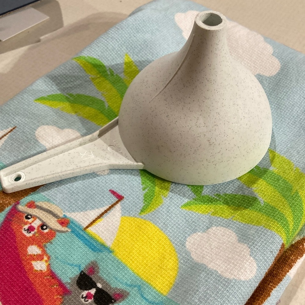 Vintage Tupperware funnel.
